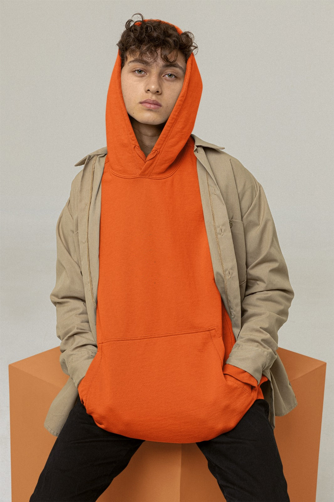 A neon orange color hoodie crafted with the finest materials for ultimate comfort and style.