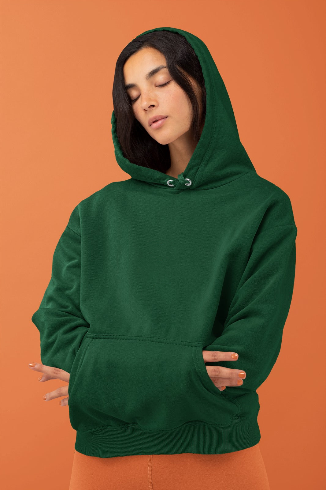A forest green mid-weight hoodie perfect for daily wear, tailored for women.