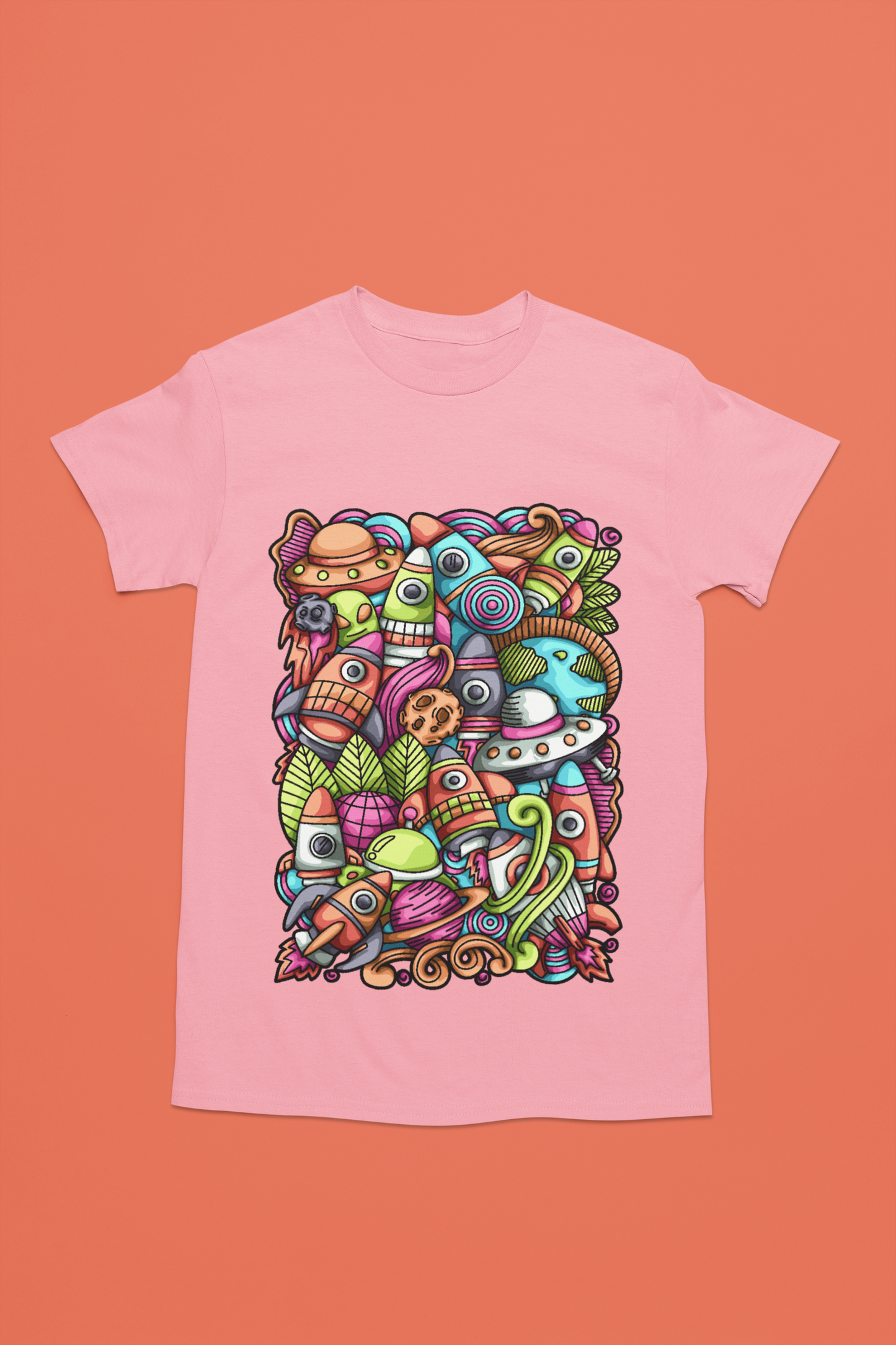 Colorful alien rocket printed on light pink t-shirt.