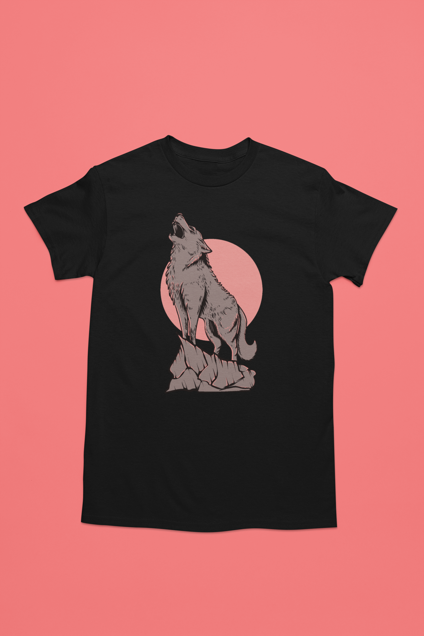 A black t-shirt with serene and enchanting scene of a wolf in the moonlight, with the full moon illuminating the wilderness.