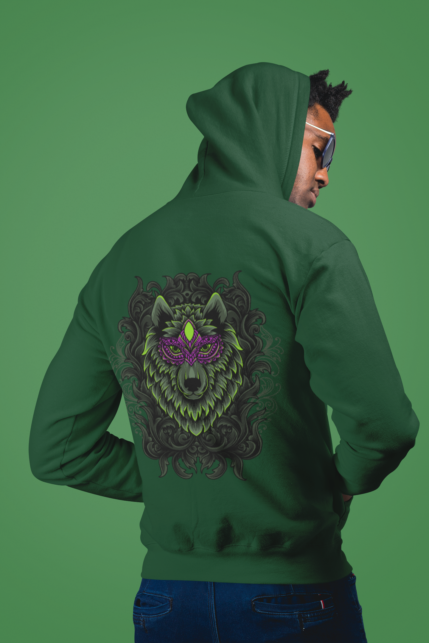 A men wearing a forest green fashionable hoodie showcasing the elegance and might of Wepwawet, the ancient Egyptian god.