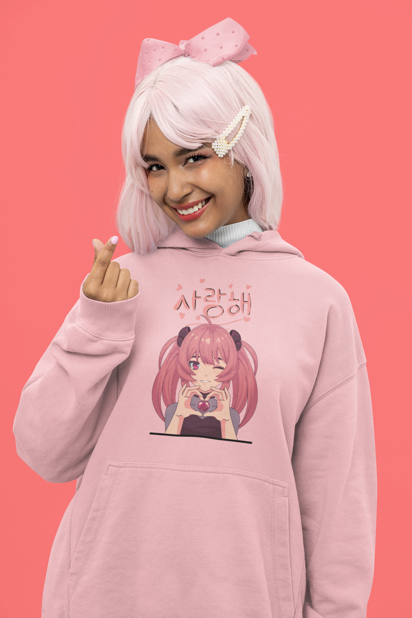 Posing Korean's heart shape with fingers and wearing premium hoodie