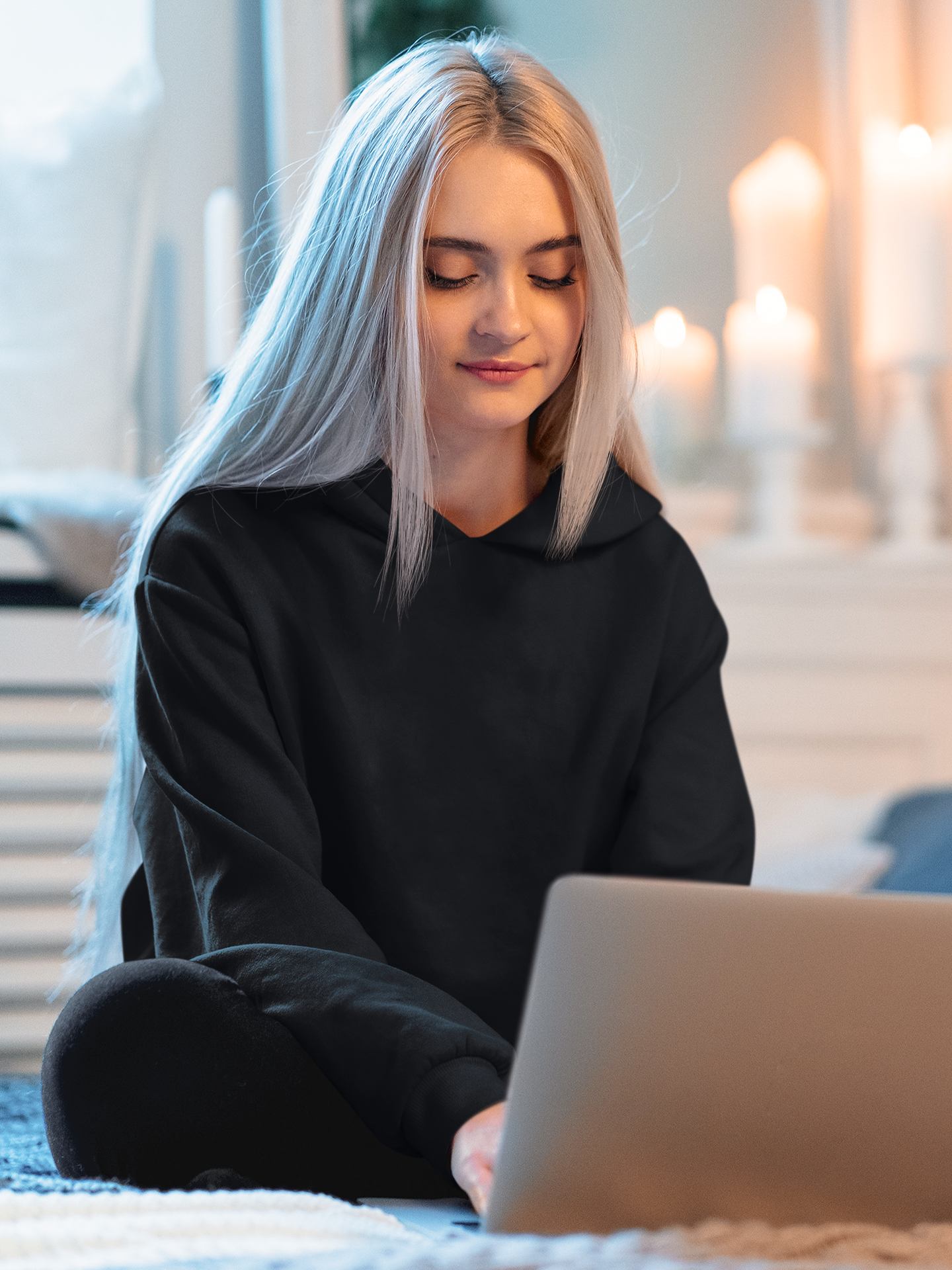 A black mid-weight hoodie perfect for daily wear, tailored for women.