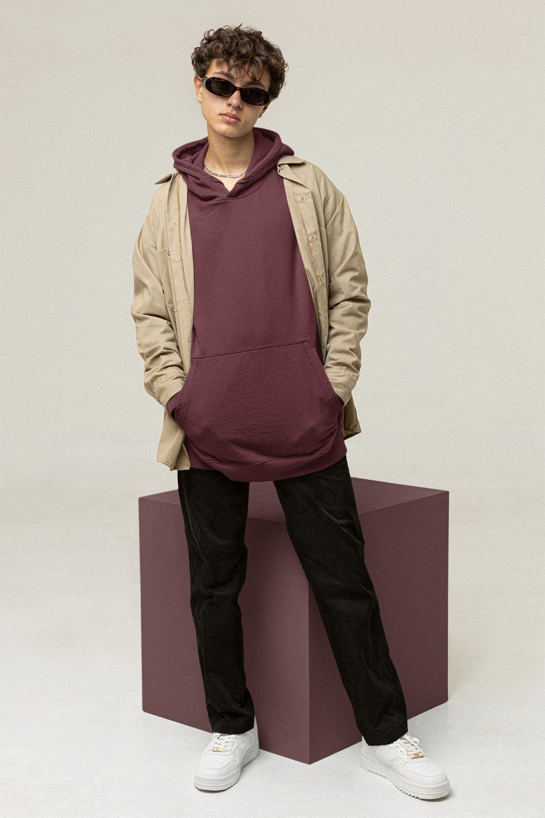 A maroon color hoodie crafted with the finest materials for ultimate comfort and style.