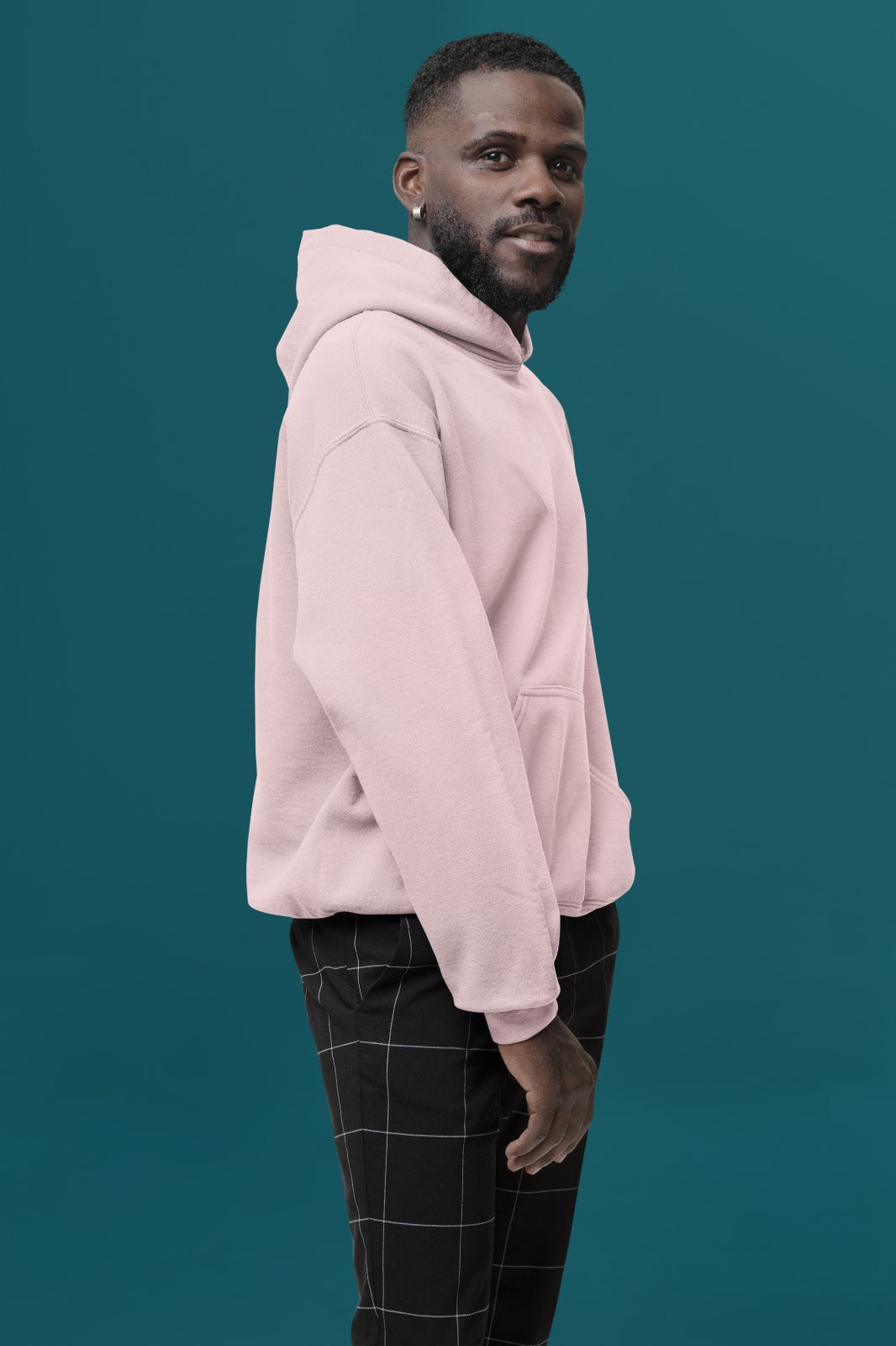 This light pink hoodie offers a luxurious feel with its soft, premium fabric lining