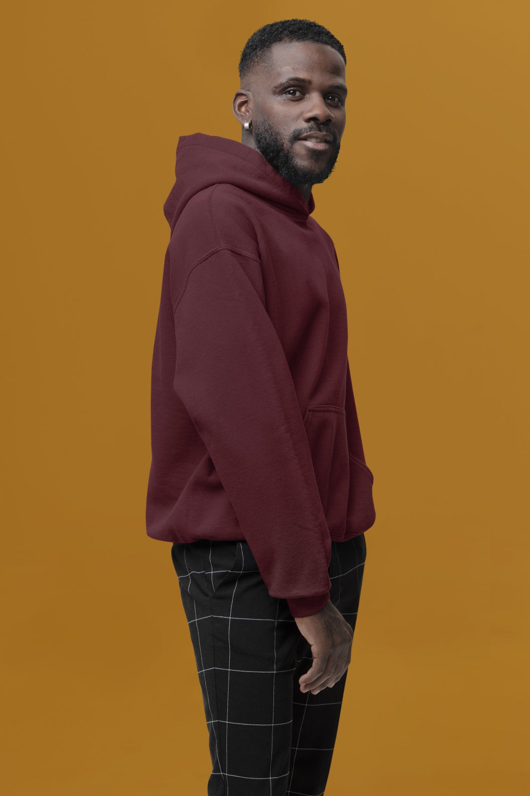 This maroon hoodie offers a luxurious feel with its soft, premium fabric lining