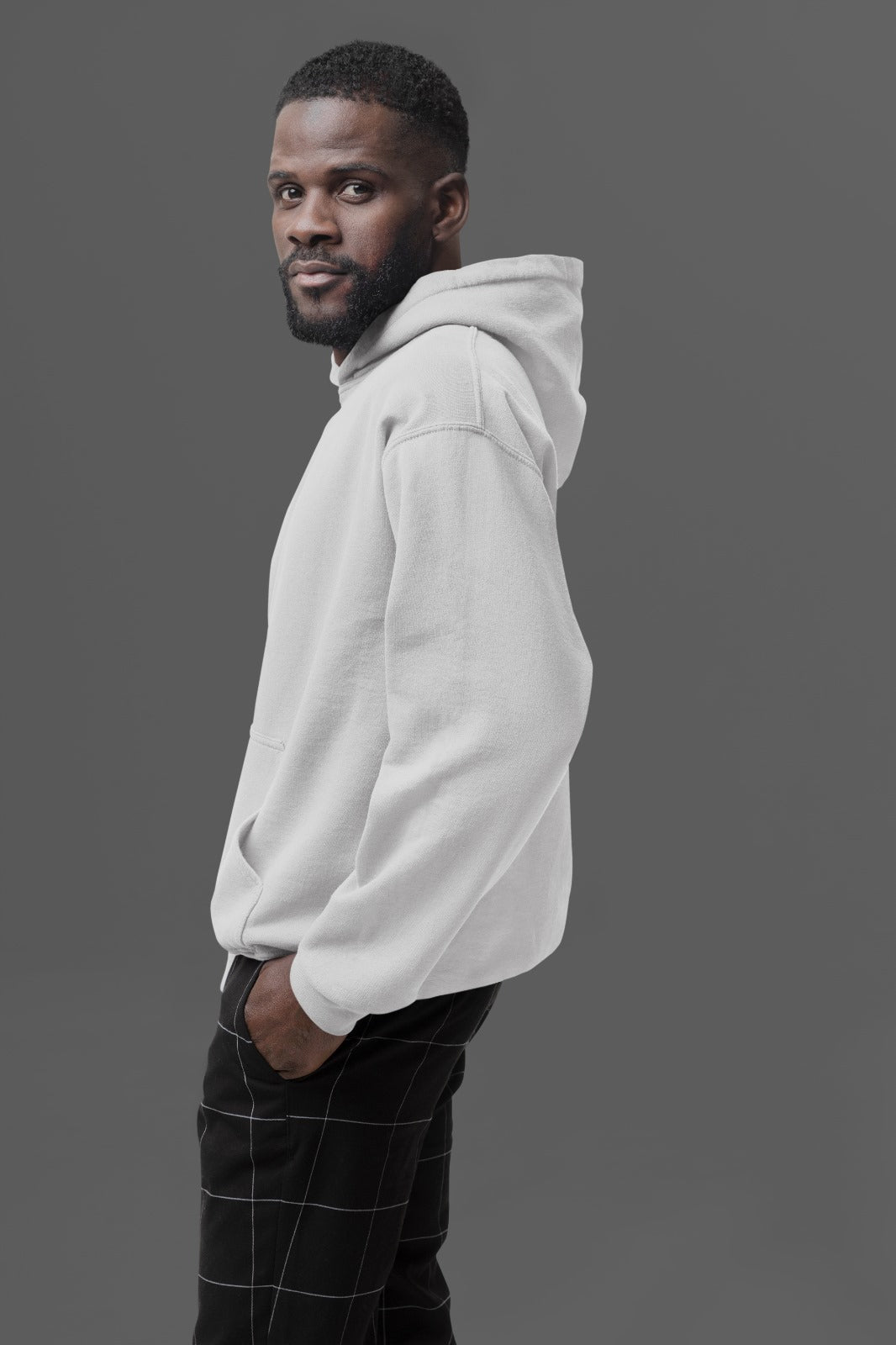 This grey heather hoodie offers a luxurious feel with its soft, premium fabric lining