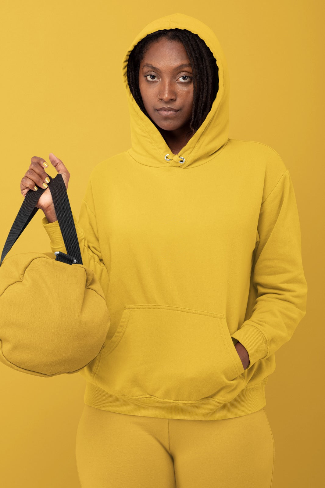 A mustard mid-weight hoodie perfect for daily wear, tailored for women.