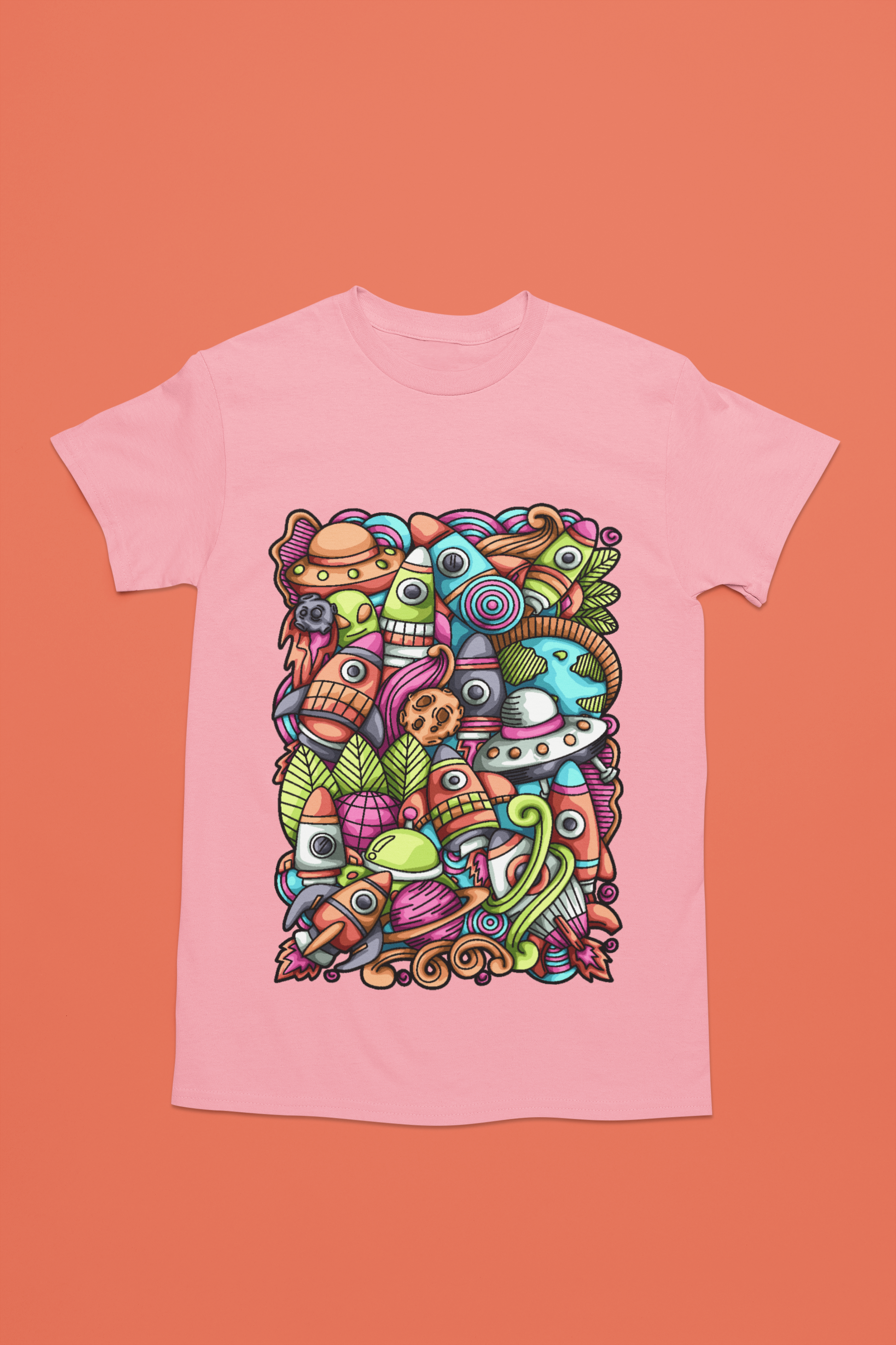 Colorful alien rocket printed on light pink t-shirt.