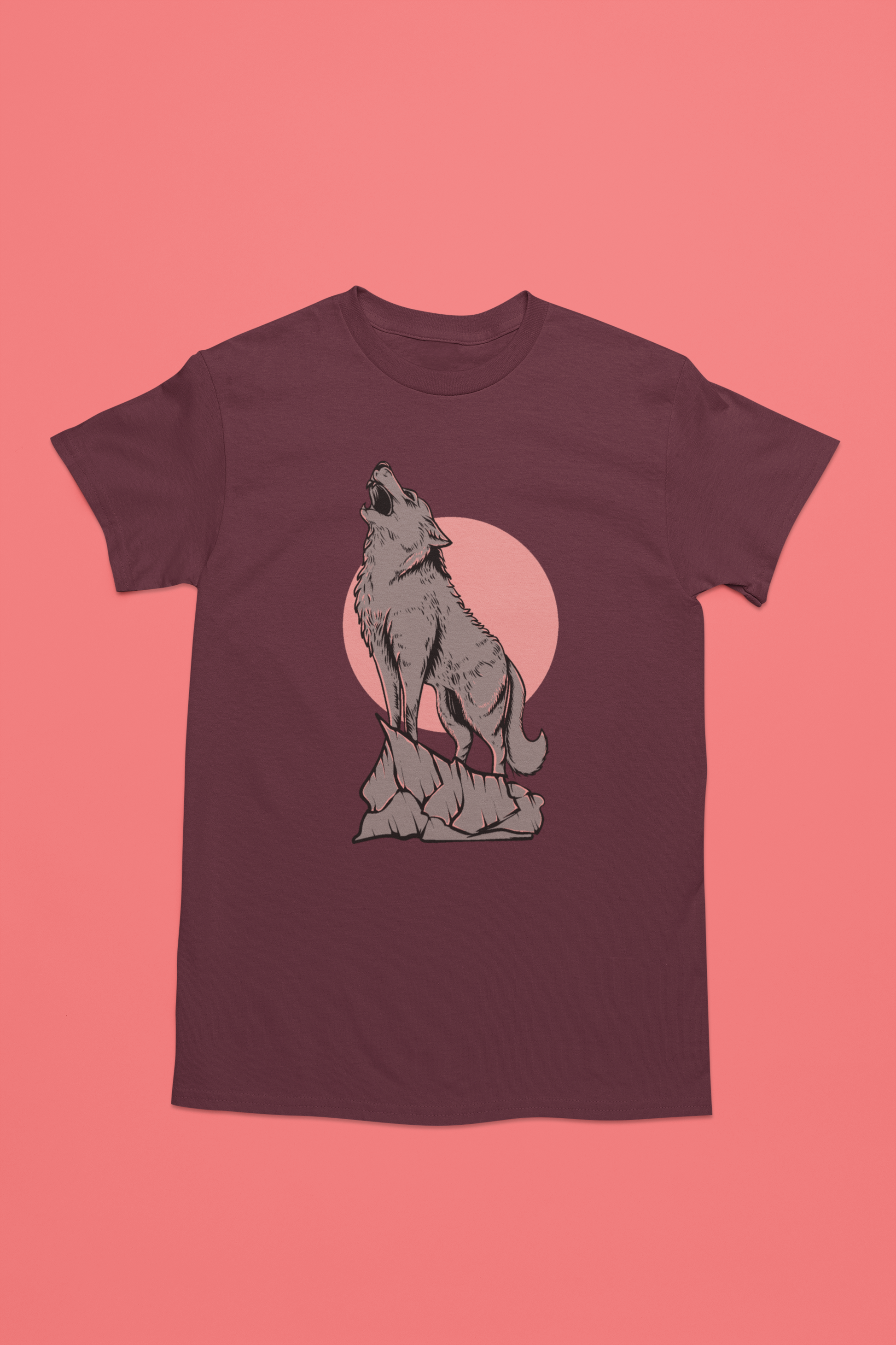 A maroon t-shirt with serene and enchanting scene of a wolf in the moonlight, with the full moon illuminating the wilderness.