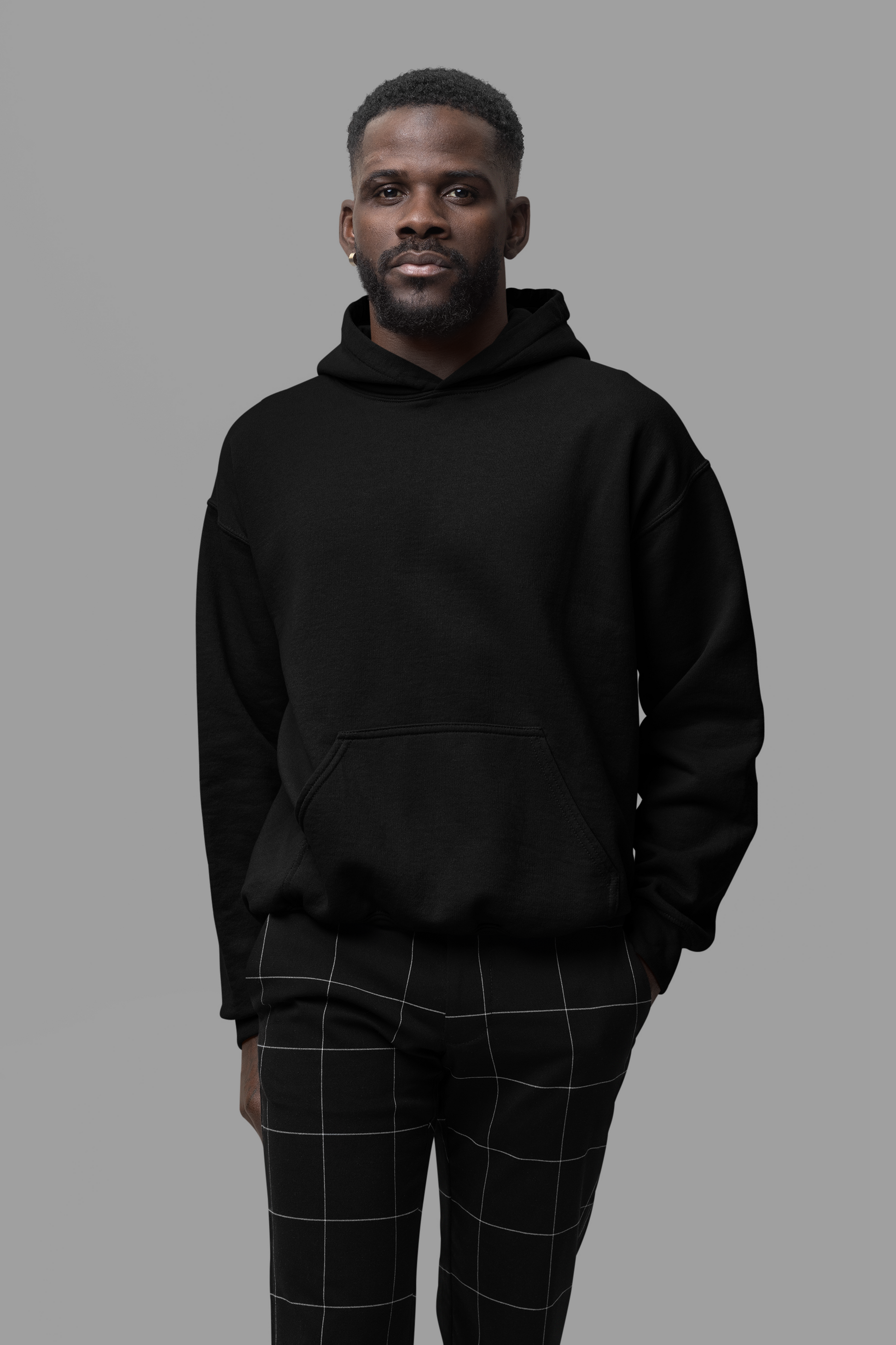 This black hoodie offers a luxurious feel with its soft, premium fabric lining