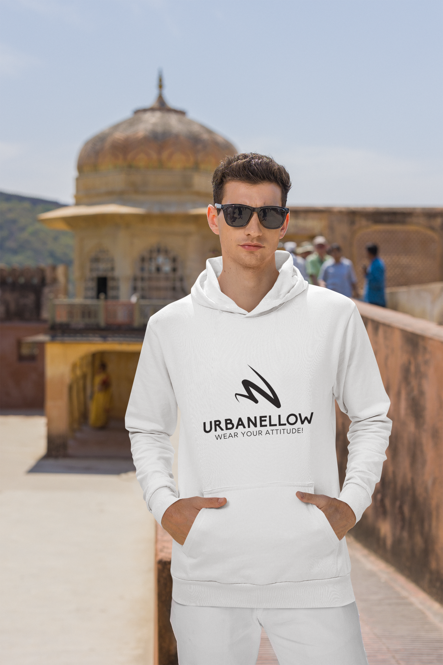 A men wearing white color top-tier premium hoodie representing the Urbanellow brand's commitment to quality and style.