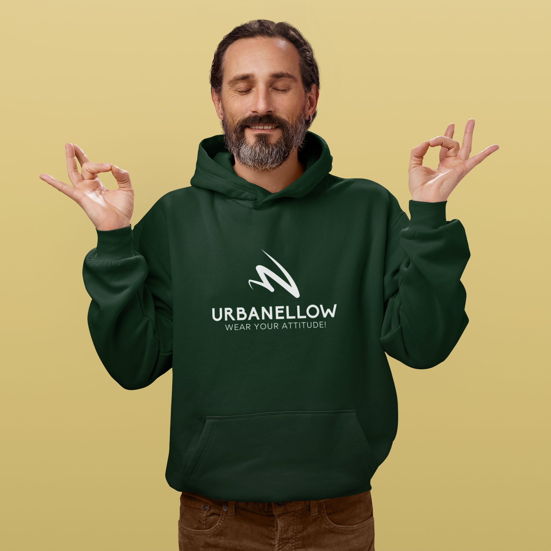 A men wearing forest green color top-tier premium hoodie representing the Urbanellow brand's commitment to quality and style.