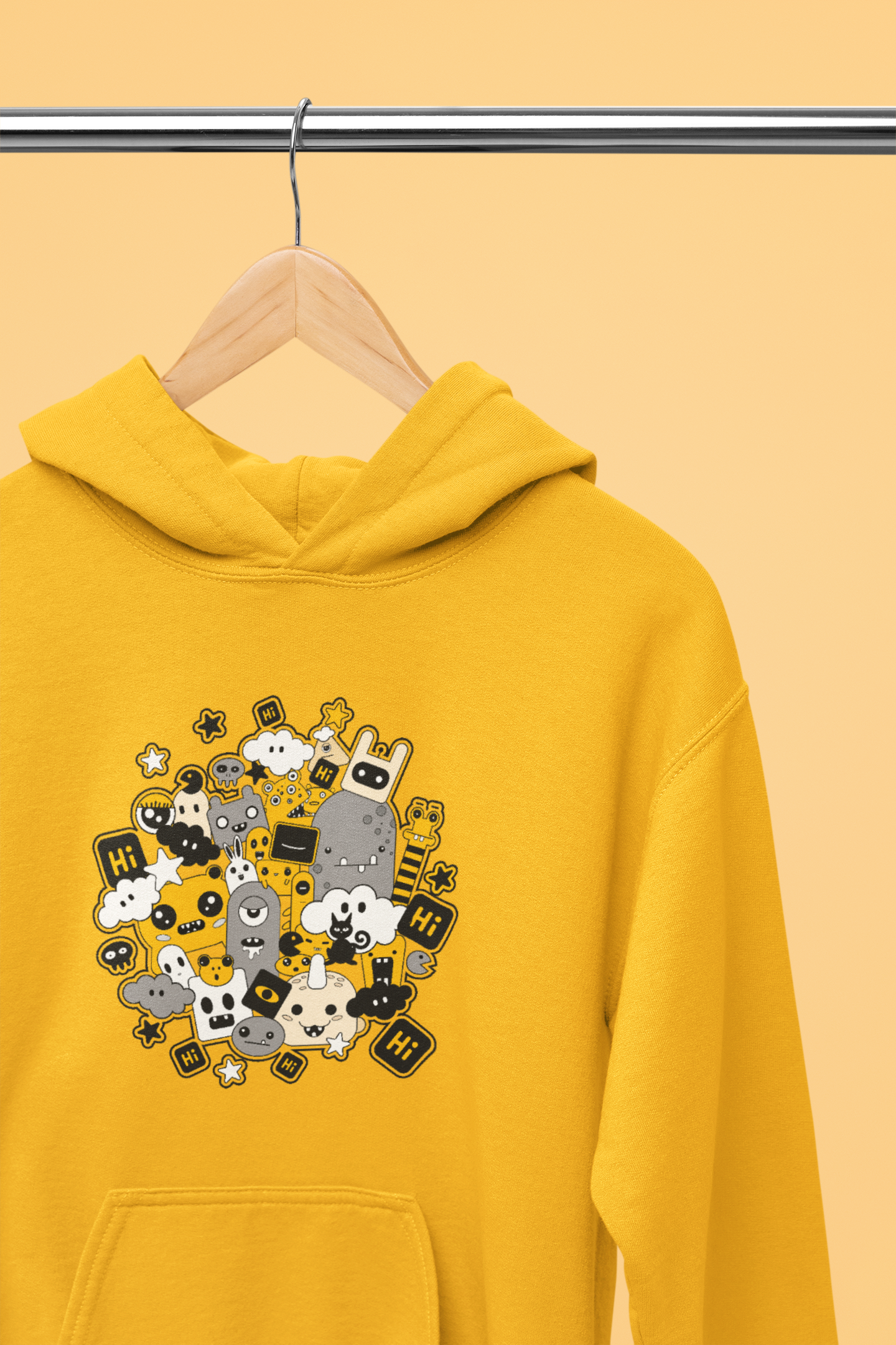 A mustard color hoodie with a playful and mischievous cartoon character, arms outstretched, ready for fun and adventure.
