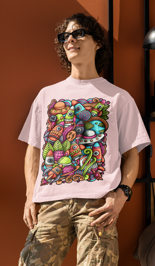 Colorful alien rocket printed on light pink t-shirt.